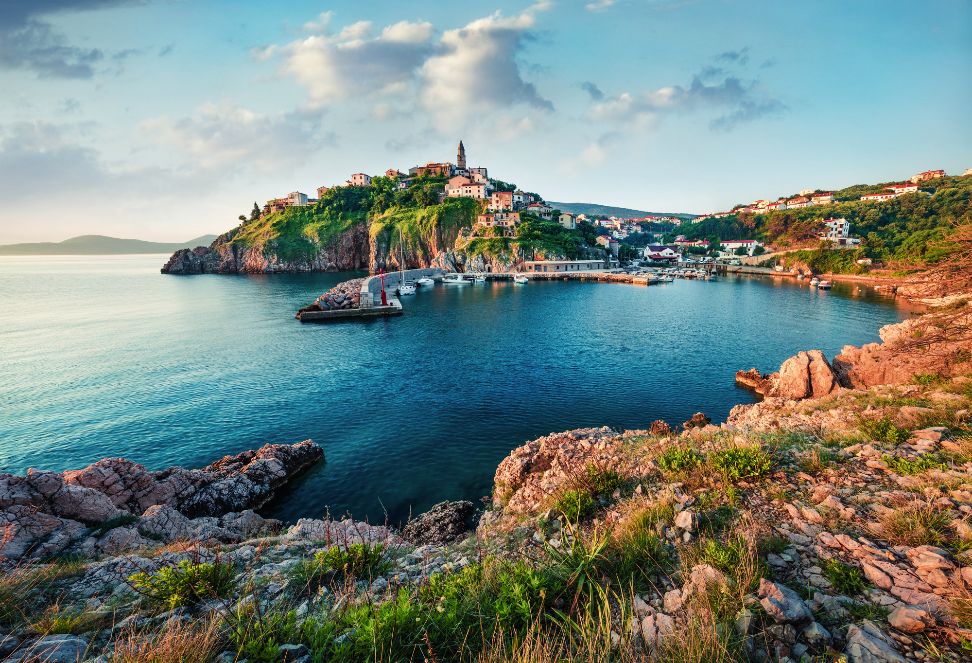 Sunny morning cityscape of Vrbnik town. Romantic summer seascape of Adriatic sea, Krk island, Kvarner bay archipelago, Croatia, Europe. Beautiful world of Mediterranean countries.